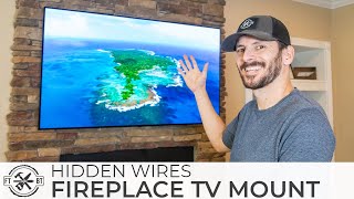 How to Mount a TV Above a Fireplace and Hide Wires [upl. by Novihc]