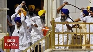 Sikh groups clash with swords at Indias Golden Temple  BBC News [upl. by Annaig]