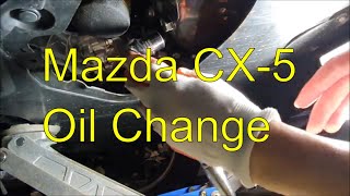 Mazda CX5 Oil Change Full Guide 20172023 [upl. by Ettenim]