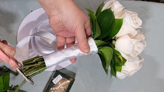 Arranging a perfect bridal bouquet with 12 roses [upl. by Haag]