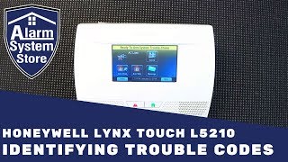 How To Clear Trouble Conditions On Honeywell Lynx L5210  AlarmSystemStore [upl. by Amme]