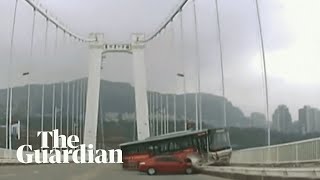 Bus careers off bridge in China as driver and passenger fight [upl. by Kcolttam]