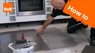 How to tile a floor part 2 laying the tiles [upl. by Ahsar]