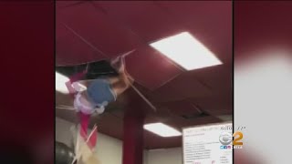 Woman Falls Through Restaurant Ceiling [upl. by Barimah]