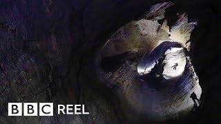 The daring journey inside the worlds deepest cave  BBC REEL [upl. by Oiramal]