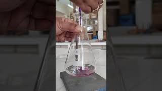 AIMPreparation and standardization of 01N KMnO4 solution against sodium Oxalate [upl. by Nissie]