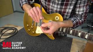 Adjusting a TuneoMatic Bridge – Guitar Setup and Maintenance [upl. by Grayson]